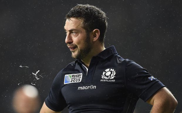 Scotland halfback and captain Greig Laidlaw reacts after losing their quarter-final at the 2015 Rugby World Cup at Twickenham, London on October 18, 2015. AFP PHOTO / MARTIN BUREAU