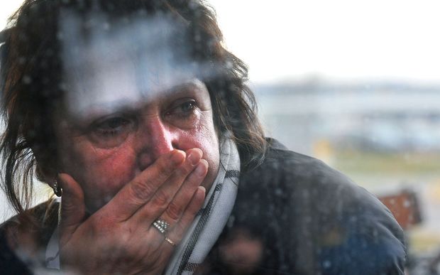 A relative reacts at Pulkovo international airport outside Saint Petersburg after a Russian plane with 224 people on board crashed in a mountainous part of Egypt's Sinai Peninsula.