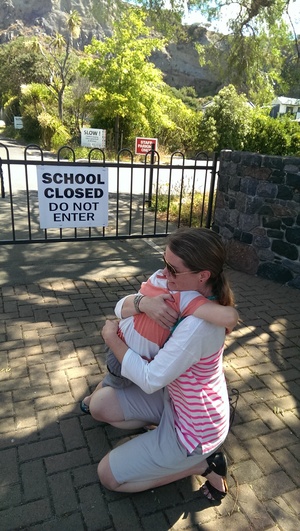 Chelsea Halliwell and her son Flynn, six, outside the old Redcliffs School site.