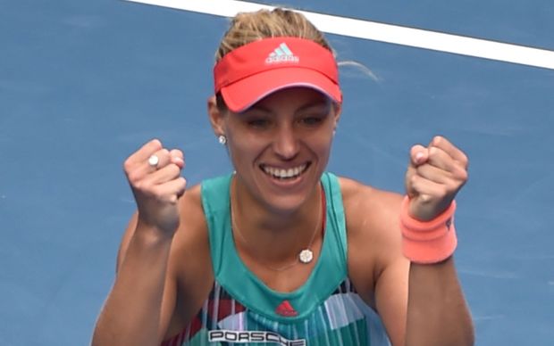 Germany's Angelique Kerber celebrates her win against Belarus's Victoria Azarenka at the 2016 Australian Open on January 27, 2016. AFP PHOTO / PAUL CROCK