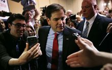 Republican presidential candidate U.S. Sen. Marco Rubio (R-FL) greets people during a campaign rally at theTampa Convention Center on March 7