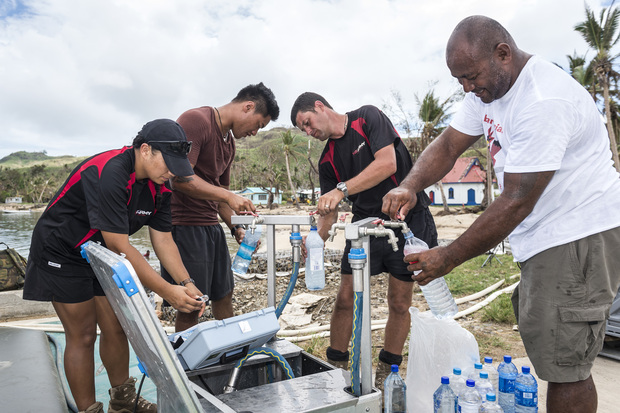 New Zealand army engineers help at a water desalination operation in Lomaloma village, Fiji after cyclone Winston.