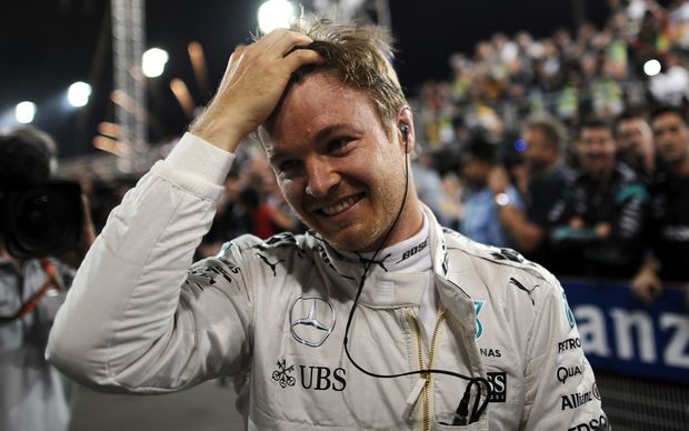 Mercedes AMG Petronas F1 Team's German driver Nico Rosberg celebrates after winning the Bahrain Formula One Grand Prix at the Sakhir circuit in Manama on April 3, 2016. 