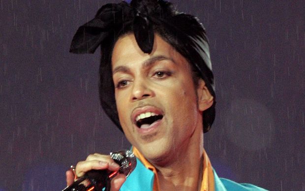 Prince, Super Bowl half time concert singing Purple Rain, Miami, 2007.