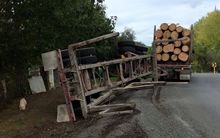 A recent log truck rollover in the same spot on Otaika Valley Road.
