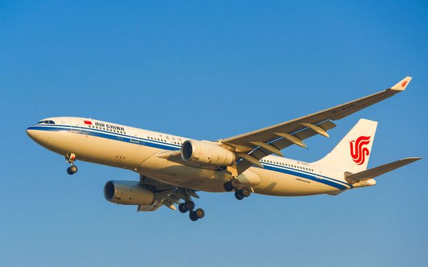 An Airbus A330-200 jet plane of Air China takes off from the Shenzhen Baoan International Airport in Shenzhen city, south China's Guangdong province, 30 December 2014.