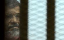 Egypt's ousted president Mohamed Morsi during his trial on espionage charges in Cairo on June 18, 2016. 