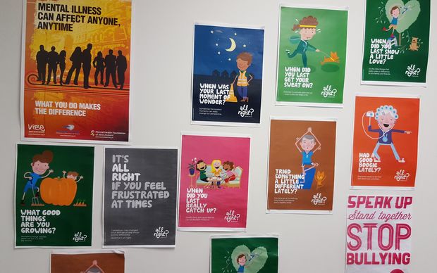 Bright coloured posters on office wall