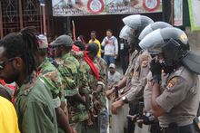 West Papuan demonstrators tightly monitored by Indonesian police.