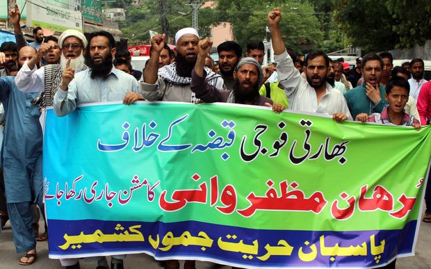 Pakistani Kashmiris protest against the killing of militant leader Burhan Wani.