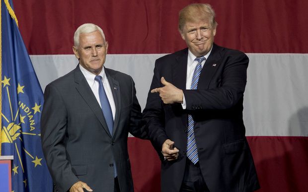 Republican presidential candidate Donald Trump greets Indiana Gov. Mike Pence at the Grand Park Events Center on July 12, 2016 in Westfield, IN.