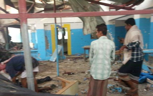 picture released by Doctors Without Borders (MSF) shows people examining a hospital operated by the NGO after it was hit by an Arab coalition air strike on August 15, 2016 in Abs.