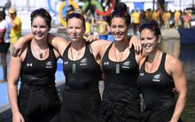 Aimee Fisher, Caitlin Ryan, Kayla Imrie and Jaimee Lovett celebrate after the Women's Kayak Four (K4) 500m semi-final at the Rio 2016 Olympic Games.