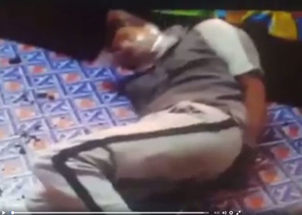 A screenshot of video showing Rajneel Singh in Fiji lying on the floor of his home during an attack. The video has been confirmed as genuine by his lawyer Aman Ravindra-Singh.