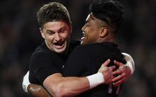 Julian Savea scores a try and celebrates with Beauden Barrett.