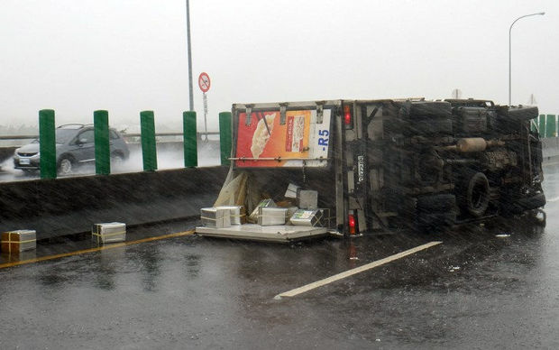 A truck is overturned as typhoon Meranti slashes southern Taiwan.