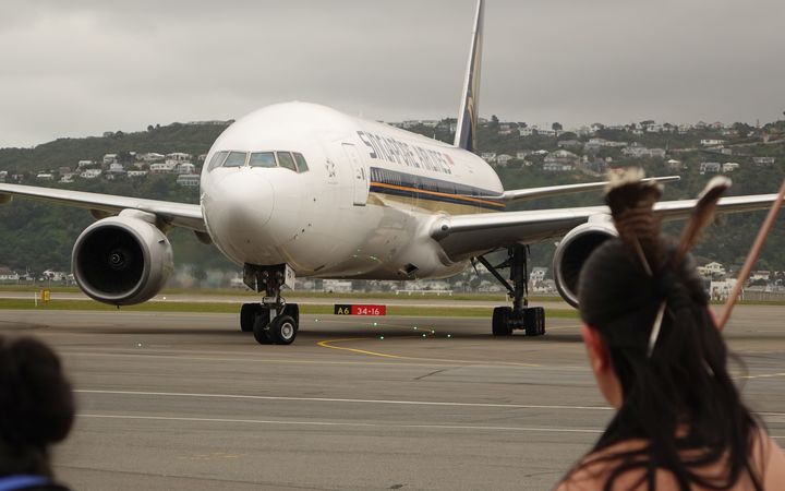 A Singapore Airlines flight arrives at Wellington Airport.