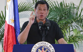 Philippines President Rodrigo Duterte speaks at Davao airport.