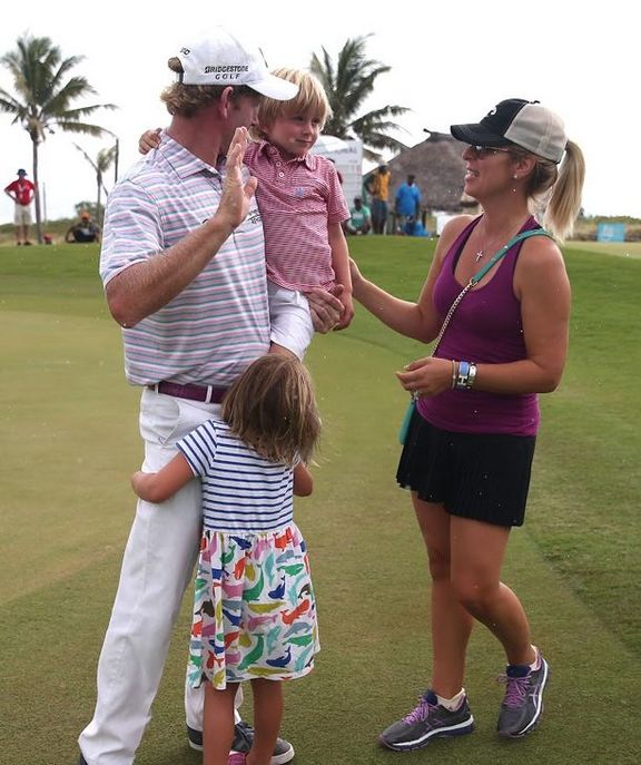 Brandt Snedeker's family embrace him after he wins the Fiji International.
