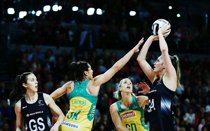 Te Paea Selby-Rickit shoots over Clare McMeniman and Sharni Layton during the Constellation Cup netball match between the New Zealand Silver Ferns and the Australian Diamonds.