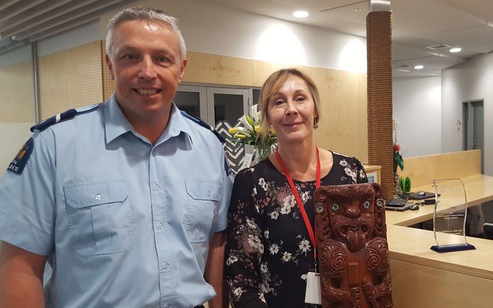 Family Protection officer, senior constable Chris Hurring and chief executive of Aviva, Nicola Woodward with the New Zealand Problem-Orientated Policing award.