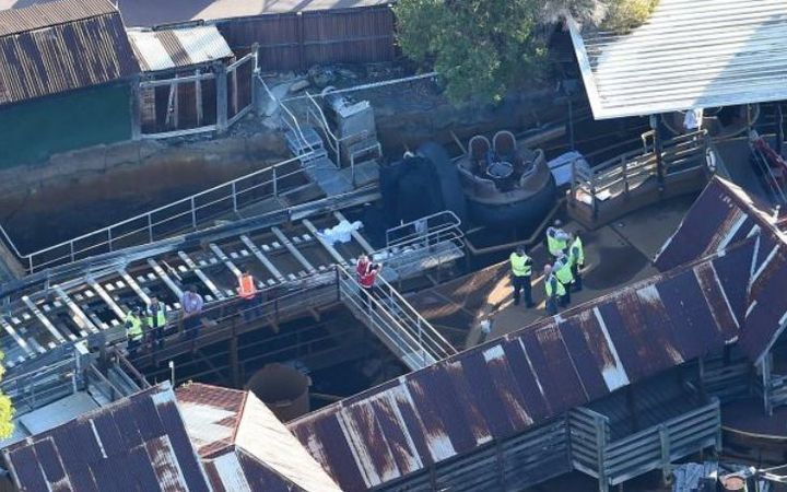 Police removing the raft from the accident site at Dreamworld.