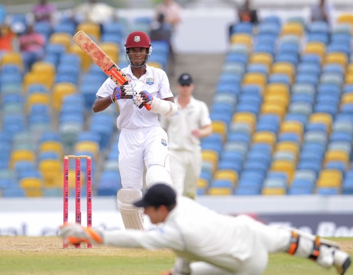 West Indies batsman Kraigg Brathwaite looks back as BJ Watling prevents him from scoring