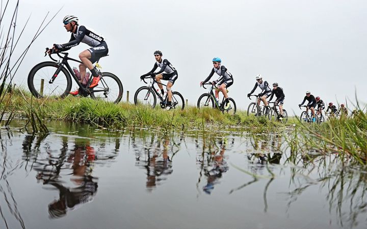 Riders in the Tour of Southland battled cold and wet conditions today.