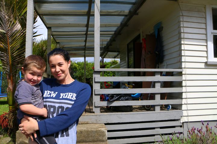 Ulanda Titford, 21 and her son, Xavier,4 standing outside their Northland house. 
