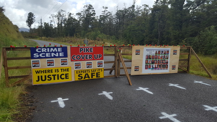 A makeshift checkpoint set up on the road to Pike River Mine by some of the families of the 29 men who died. 