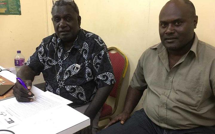 Bougainville's electoral commissioner George Manu and acting election manager George Kenatsi (February 2020)
