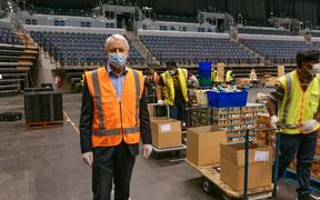 Mayor Phil Goff by the production line team at Spark Arena.