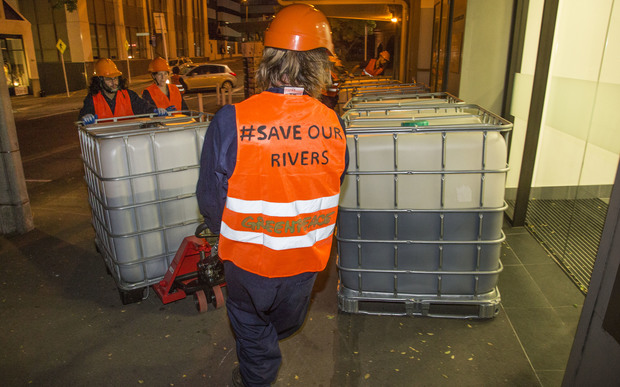 Greenpeace has dumped 6000 litres of cow urine and other dairy waste at the ACC's old Wellington head office.