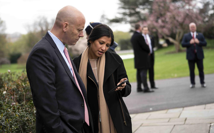  In this file photo taken on March 24, 2020 Marc Short, Chief of Staff for Vice President Mike Pence (L) talks with Katie Miller, Vice President Mike Pence's press secretary 