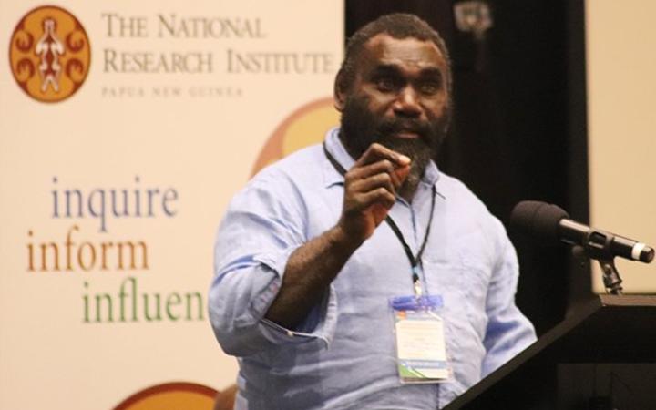 Ishmael Toroama speaking at PNG think-tank, The National Research Institute.
