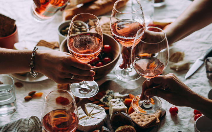 Glasses of rose wine seen during a friendly party of a celebration.