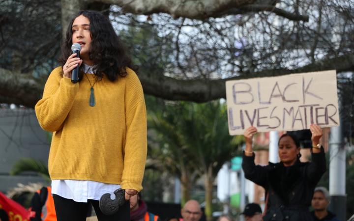 Emilie Rākete from People Against Prisons Aotearoa and the Arms Down movement speaks at the Black Lives Matter protest at Aotea Square in Auckland, on 14 June, 2020.