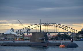 In this photo taken on October 12, 2016, a Royal Australian Navy diesel and electric-powered Collins Class submarine sits in Sydney Harbour. - 