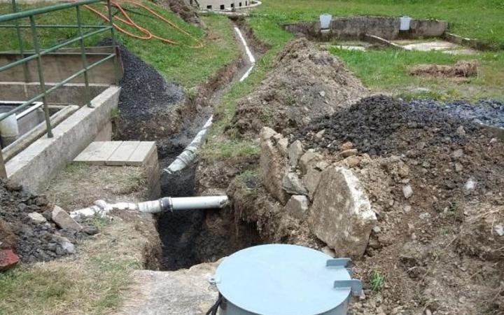 Exposed wastewater plant pipework in Waipori Falls.