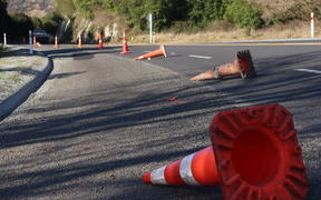 Cones left lying on the road - locals have seen them lying here for a long time
