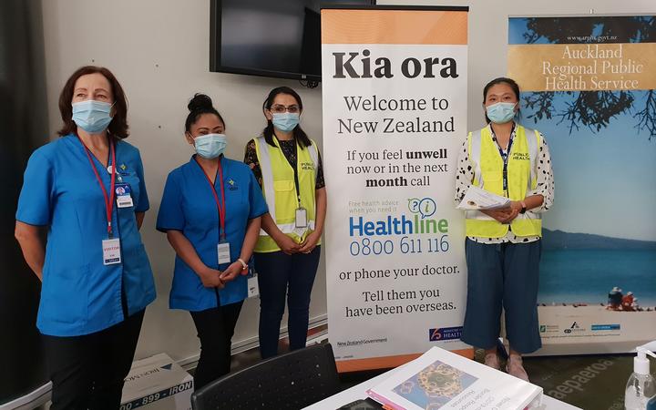 Health officials at Auckland Airport.