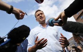 (FILES) This file photo taken on July 20, 2019 shows Russian opposition leader Alexei Navalny speaking with journalists during a rally to support opposition and independent candidates.