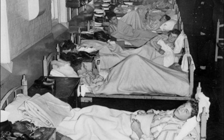 British navy soldiers in a makeshift infirmary in an Ipswich warehouse  - Sept 19 1957