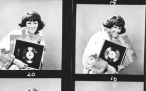 A proof sheet of unused Maria Dallas publicity shots from 1970. Maria is holding the gold disc for her No.1 single Pinocchio.