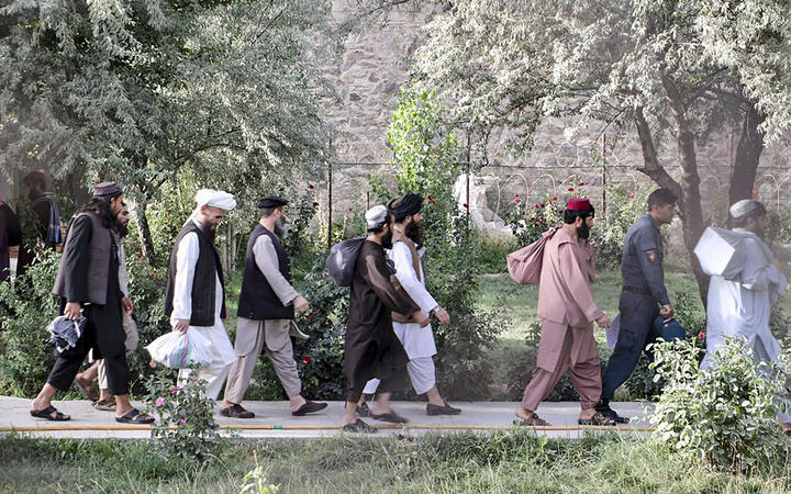 Taliban prisoners in the process of being released from Pul-e-Charkhi prison on the outskirts of Kabul on August 13, 2020.