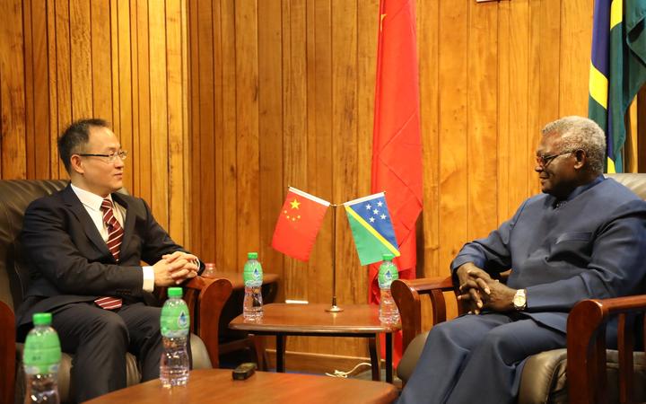 Solomon Islands prime minister Manasseh Sogavare (right) with Li Ming, China's first ambassador to the Solomon Islands.