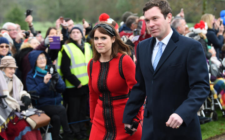 Princess Eugenie of York and her husband Jack Brooksbank arrive for the Royal Family's traditional Christmas Day service in eastern England, on December 25, 2018.