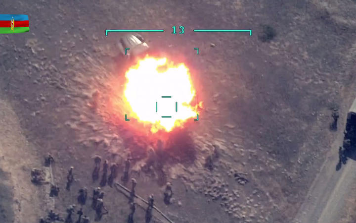 An image grab from a video on the official website of the Azerbaijani Defence Ministry on September 30, 2020, allegedly shows Azeri units destroying Armenian forces during fighting over the breakaway Nagorny Karabakh region. 