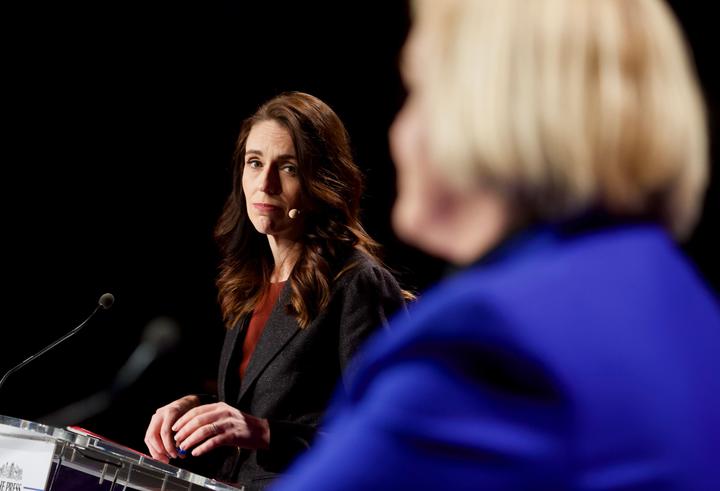 Labour leader Jacinda Ardern looks on as National leader Judith Collins speaks at The Press debate in Christchurch.  06/10/20