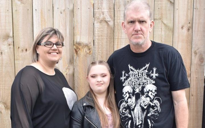 Tarryn Attwell (centre) suffers from chronic pain and her family is struggling to find help.
